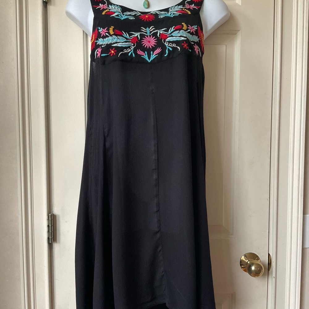 Floral embroidered beach dress purchased in Miami boutique.